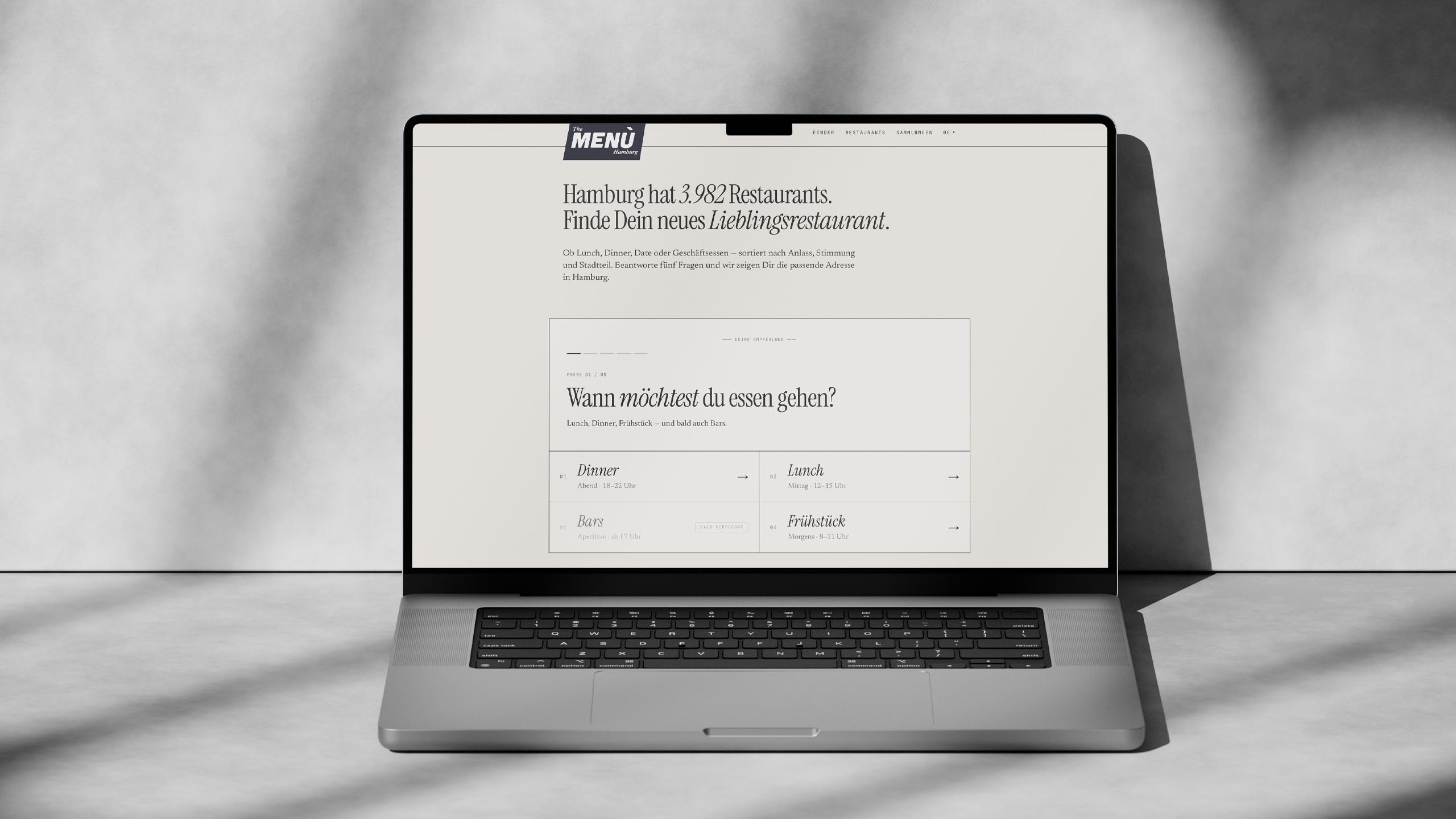 The Menù Hamburg auf dem Laptop: Startseite mit Restaurantfinder